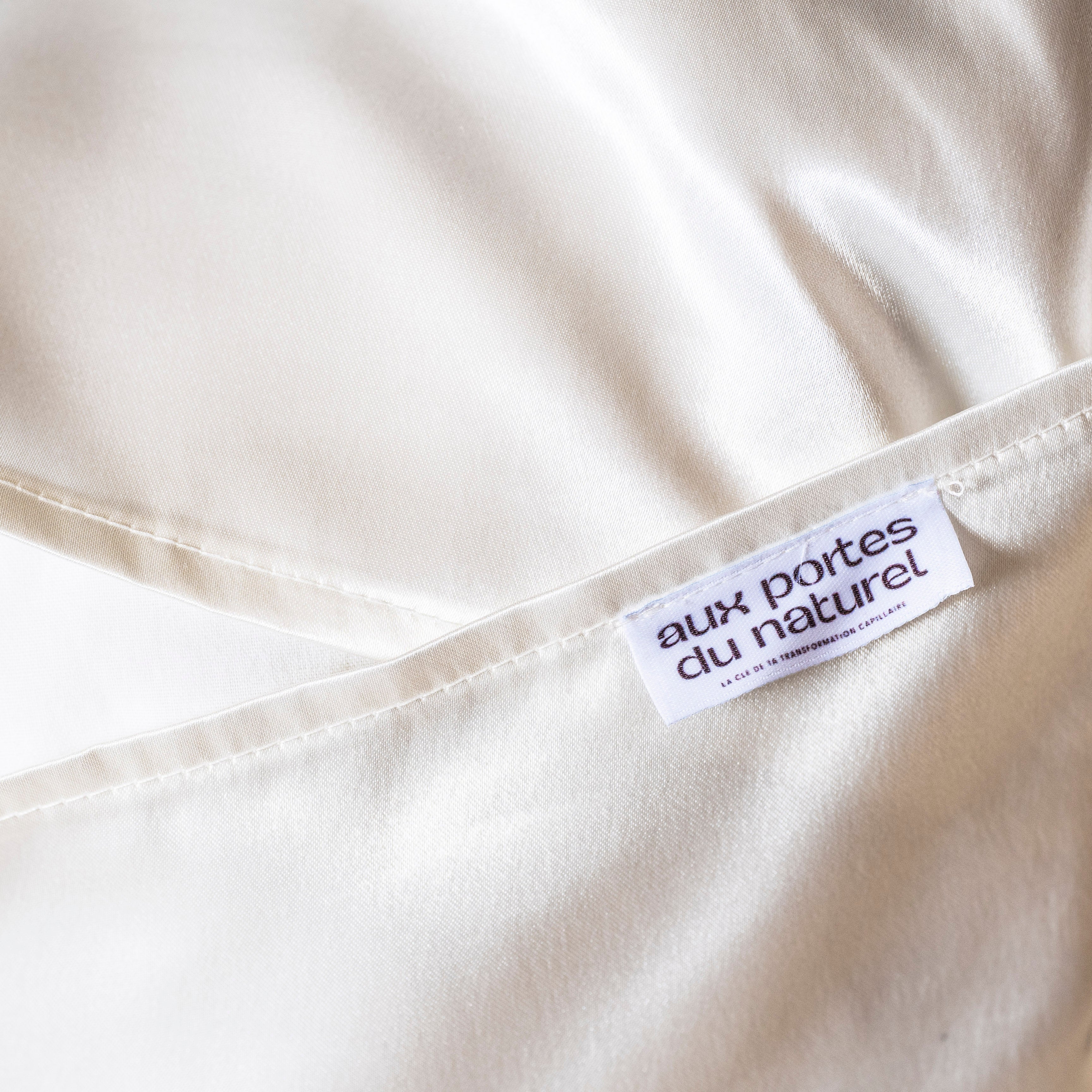 taie d'oreiller satin blanc cassé